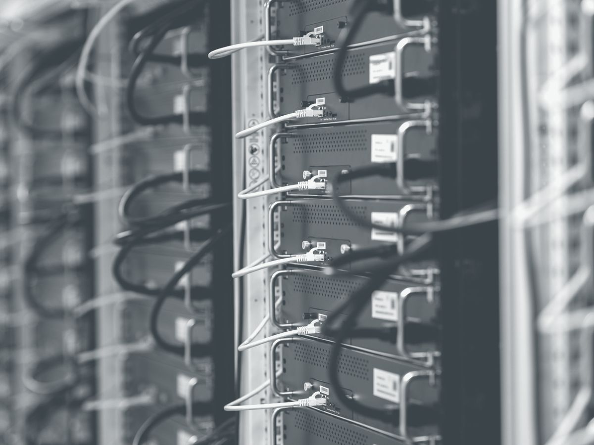 Hydro-cooled ASIC miners with network cables and labels