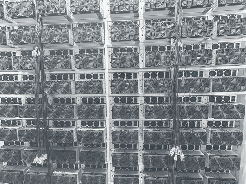 Wall of ASIC miners at our site in the United States